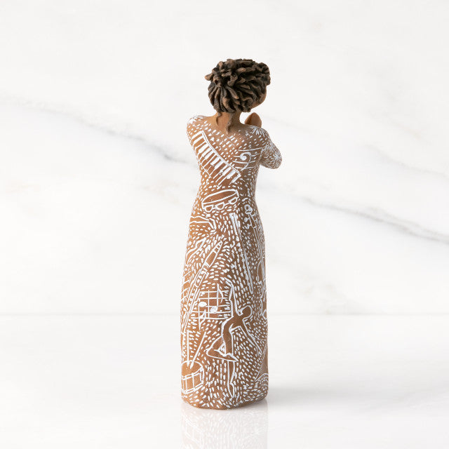 Detail view of Music Speaks Figurine – Darker Skin Musician Gift for musicians and performers